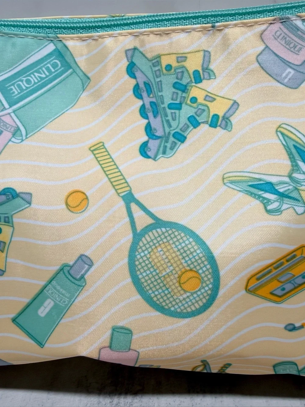 CLINIQUE Yellow & Teal Tennis Graphic Cosmetic Pouch